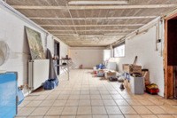 Te koop: handelsruimte + loods (215m²) en ruime woning. 9