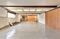 Te koop: handelsruimte + loods (215m²) en ruime woning. 10