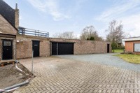 Te koop: handelsruimte + loods (215m²) en ruime woning. 32