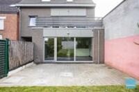 Appartement met tuin en 2 carports 2