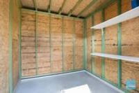 Appartement met tuin en 2 carports 5