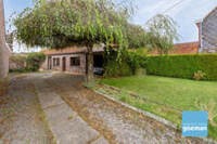 Bungalow met oprit, carport en afzonderlijke berging op rustige locatie 1