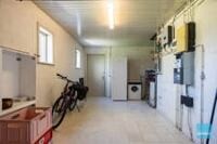 Degelijke halfopen bebouwing met 4 slaapkamers en garage 18
