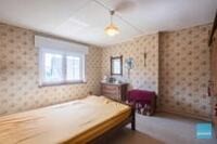 Zeer stevige woning op een mooi stuk grond van meer dan 14 are! 10